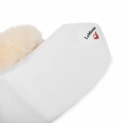 LeMieux Lambswool Overreach Boots -Equestrian Supplies Store lambswool bell boot white strap lemieux 73312.1638568731